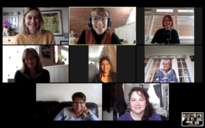 Photo of Zoom meeting of everyone who attended smiling